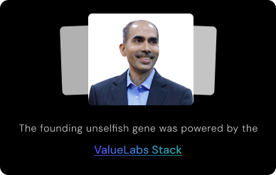 Portrait of a smiling man in a dark blazer and light blue shirt, with gray overlapping cards in the background; caption below mentions 'The founding unselfish gene was powered by the ValueLabs Stack.'